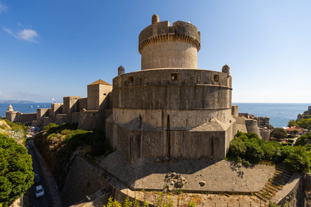 Vivid contrast of blue sky and red tiled roofs is hallmark of Dubrovnik Fortress.