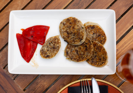 Traditional spanish girella lamb sausage on plate