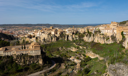 Historic walled town of Cuenca - Spain. This view shows the Hanging Houses perched on cliffsideの写真素材