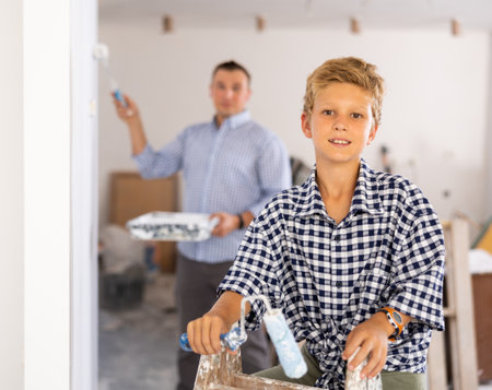 Boy posing with tools for home renovationの写真素材