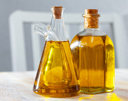 Assortment of olive oil on wooden tableの写真素材