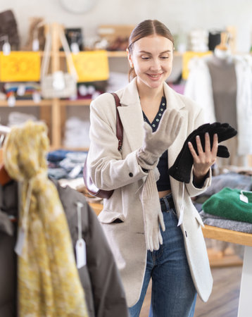 Woman chooses warm glovesの写真素材