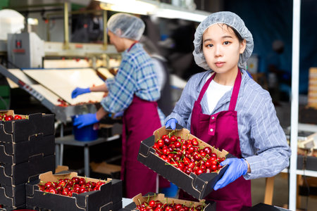 Girl is working in a warehouse