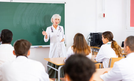 Professor reading lecture to group of medical studentsの写真素材