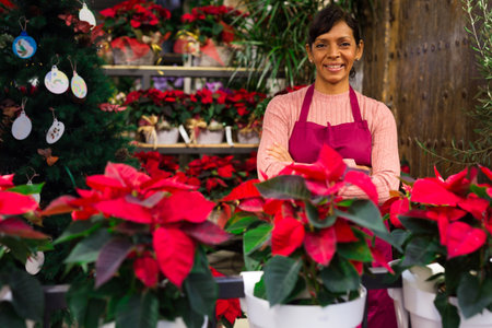 Female florist standing in salesroomの写真素材