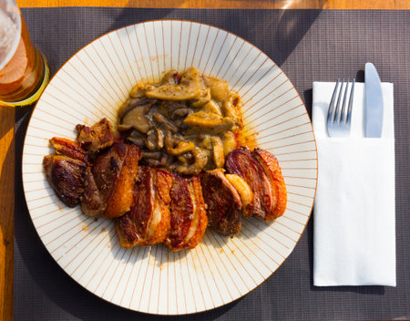 Fried duck breast Magre served with mushroomsの写真素材