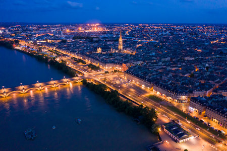 Illuminated Bordeaux city at nightの写真素材