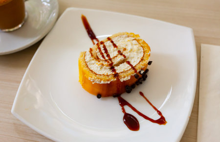 Delicious roll sponge cake with vanilla cream