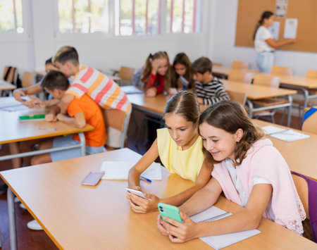 Girls studying subjects in schoolの写真素材