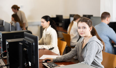 Young woman working on computerの写真素材