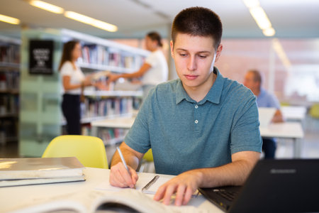 Smart male student preparing for the examの写真素材