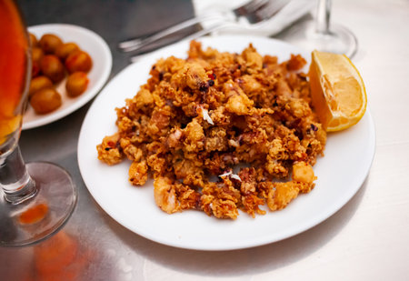 Spanish seafood dish battered fried baby squidの写真素材