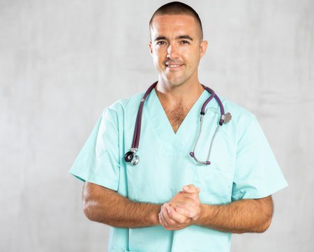 Portrait of male health worker meeting patient in medical officeの写真素材