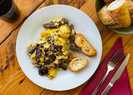 Omelette with mushrooms and sausage