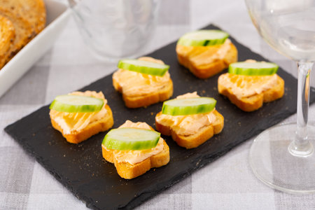 Tasty snack before lunch - sandwiches with cucumber and pateの写真素材