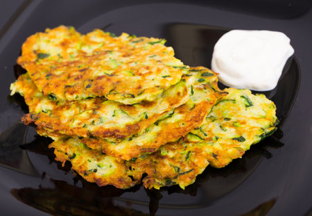 Photography of plate with pancakes from courgettesの写真素材