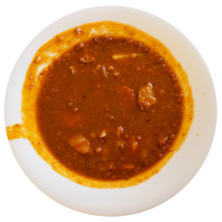 Red lentil soup with carrots and pork piecesの写真素材