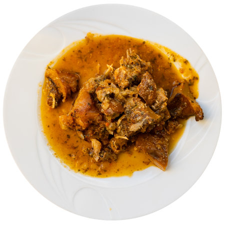 Rabbit meat cooked with saffron milk caps, carrots and Provencal herbs.の写真素材