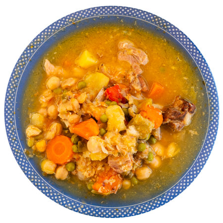 Plate with portion of hot chickpea and meat soupの写真素材