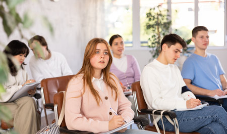Teenager students listening in classroom schoolの写真素材