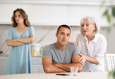 Young wife and mother quarrel