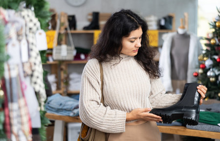 Latina choosing platform boots for Christmas