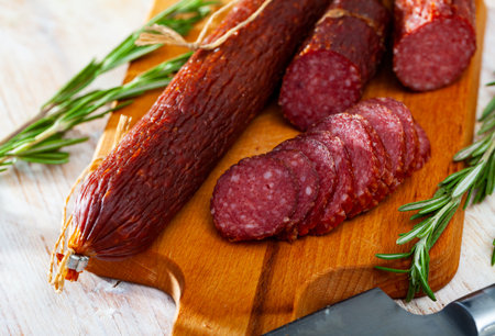 Smoked sausage with rosemaryの写真素材