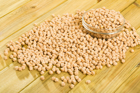 Glass bowl of raw chickpea grainsの写真素材