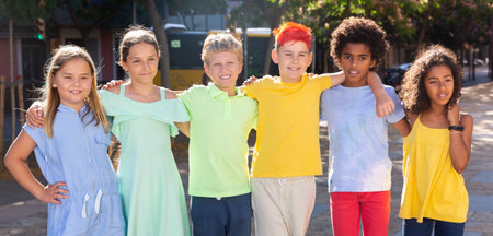Group photo of positive kids outdoors