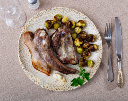 Cooked pork ribs with Brussels cabbageの写真素材