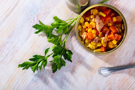 Tuna salad with corn and boiled carrot in tin canの写真素材
