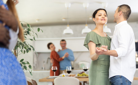 Couples of men and women dancing slow danceの写真素材