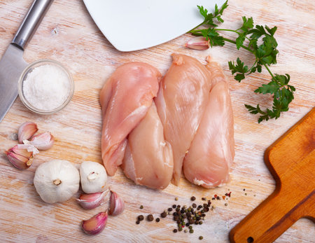 Raw chicken breast fillet ready for cookingの写真素材