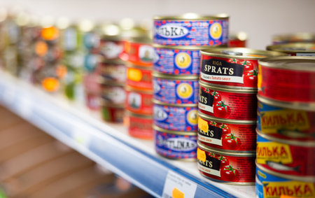 SPAIN, BARCELONA - FEBRUARY 12, 2024: Canned fish on counter of Russian goods store, Spain, Barcelonaのeditorial素材