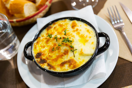 Cauliflower with potatoes baked gratin close up