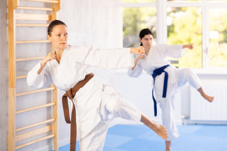 perfecting their roundhouse kicksの写真素材