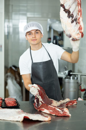 man behind counter prepares