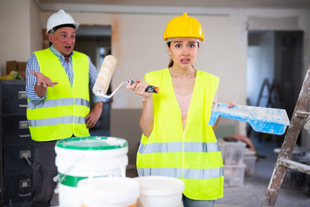 Desperate woman house painter having work problemsの写真素材