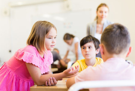 Children performing group tasksの写真素材