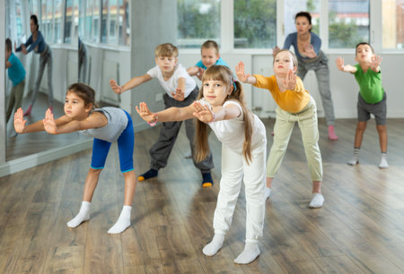 Group of children warming up before dance classの写真素材