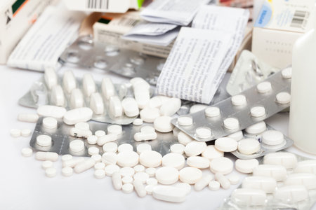 Tablets and capsules pills on white backgroundの写真素材