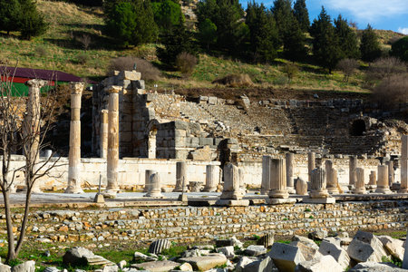 Ruins of the Upper Agora at Ephesus ancient site in Turkey. View of fragments of columns; with...