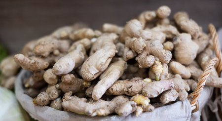 Ginger root in a basket on the counterの写真素材
