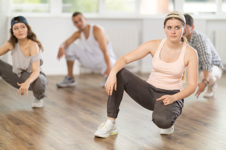 Group of young dancers practicing in dance studio