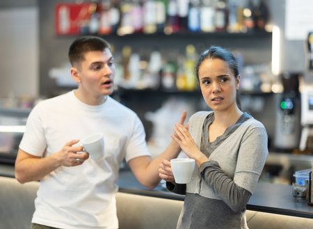 woman drinks coffee and does not want to meet a guy