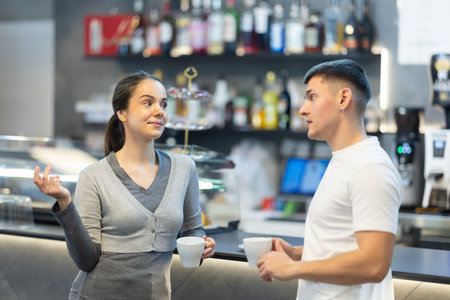 Couple is having nice conversation during coffee breakの写真素材