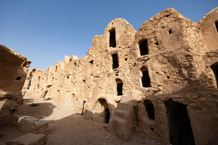 Uninhabited fortified village with houses and granaries, Tunisia. Ksar of Mgabla, Berber, Tataouine.の写真素材
