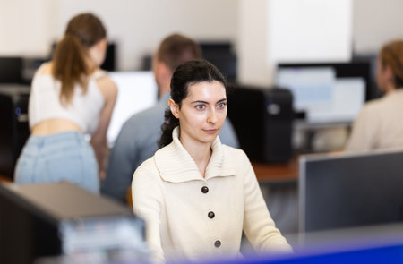 Female student at computers in university computer class