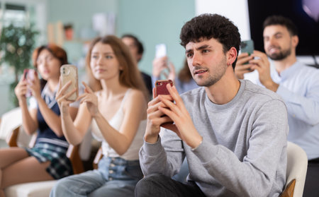 Students take pictures of screen or scan QR codeの写真素材
