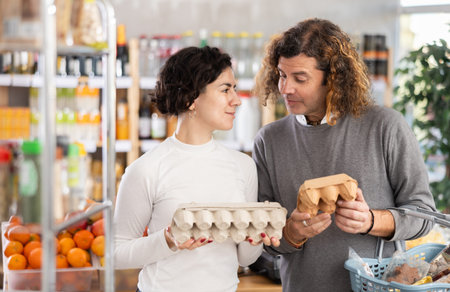 Couple picking eggsの写真素材